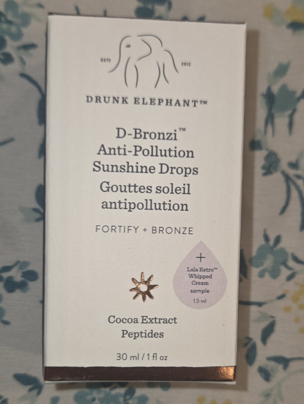 Drunk Elephant D-Bronzi Anti-Pollution Sunshine Drops – White & Rose Gold Accent